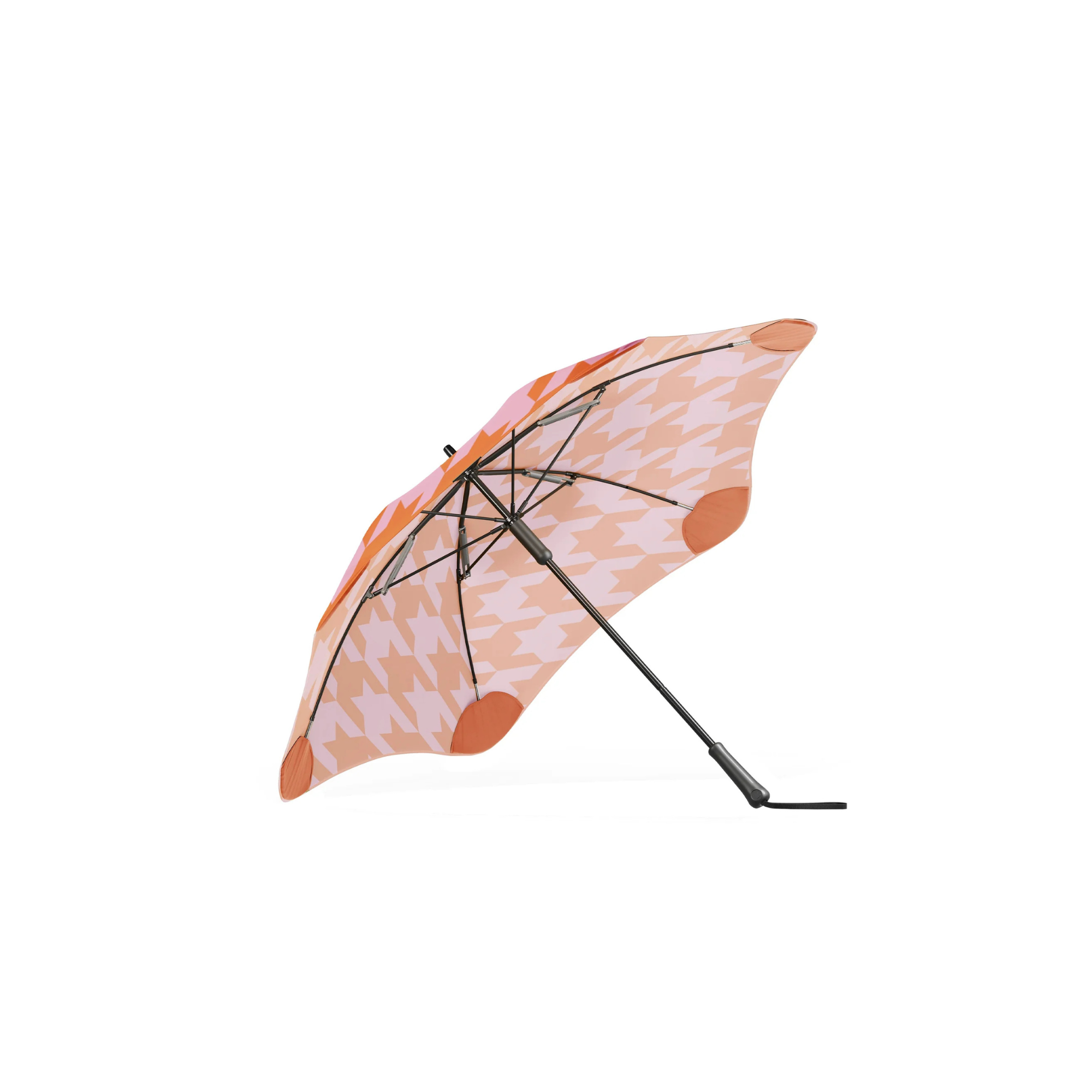 Orange and pink patterned umbrella on a white background