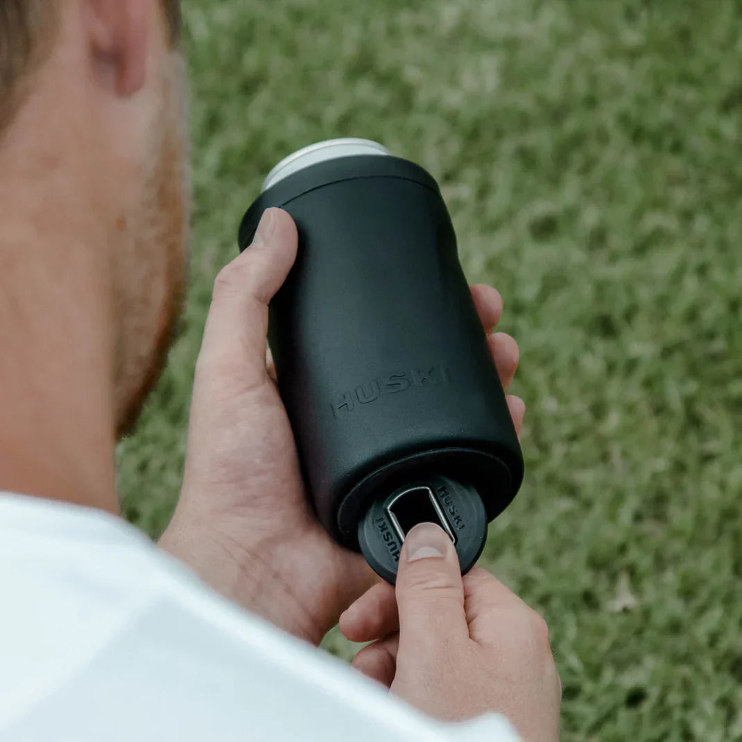 A man using a Huski can cooler
