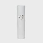 White cylindrical container with a silver heart-shaped emblem on a light gray background