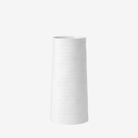 White textured vase on a light gray background